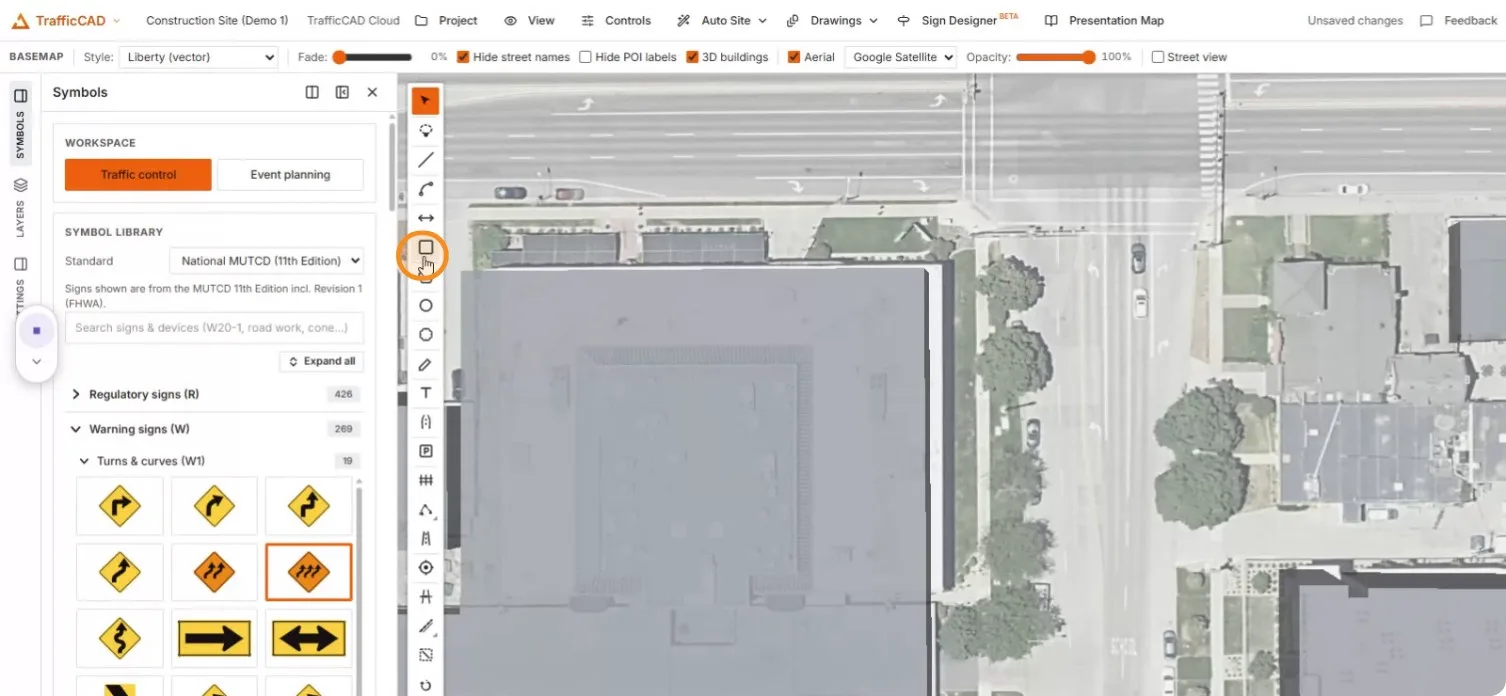 The TrafficCAD workspace with the MUTCD symbol library open over aerial imagery