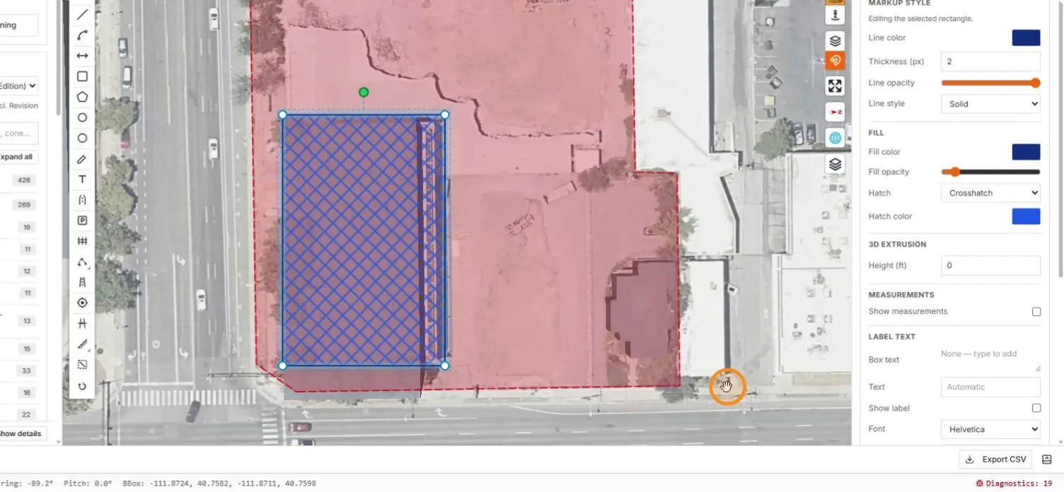 The building rendered with a blue crosshatch fill inside the red boundary