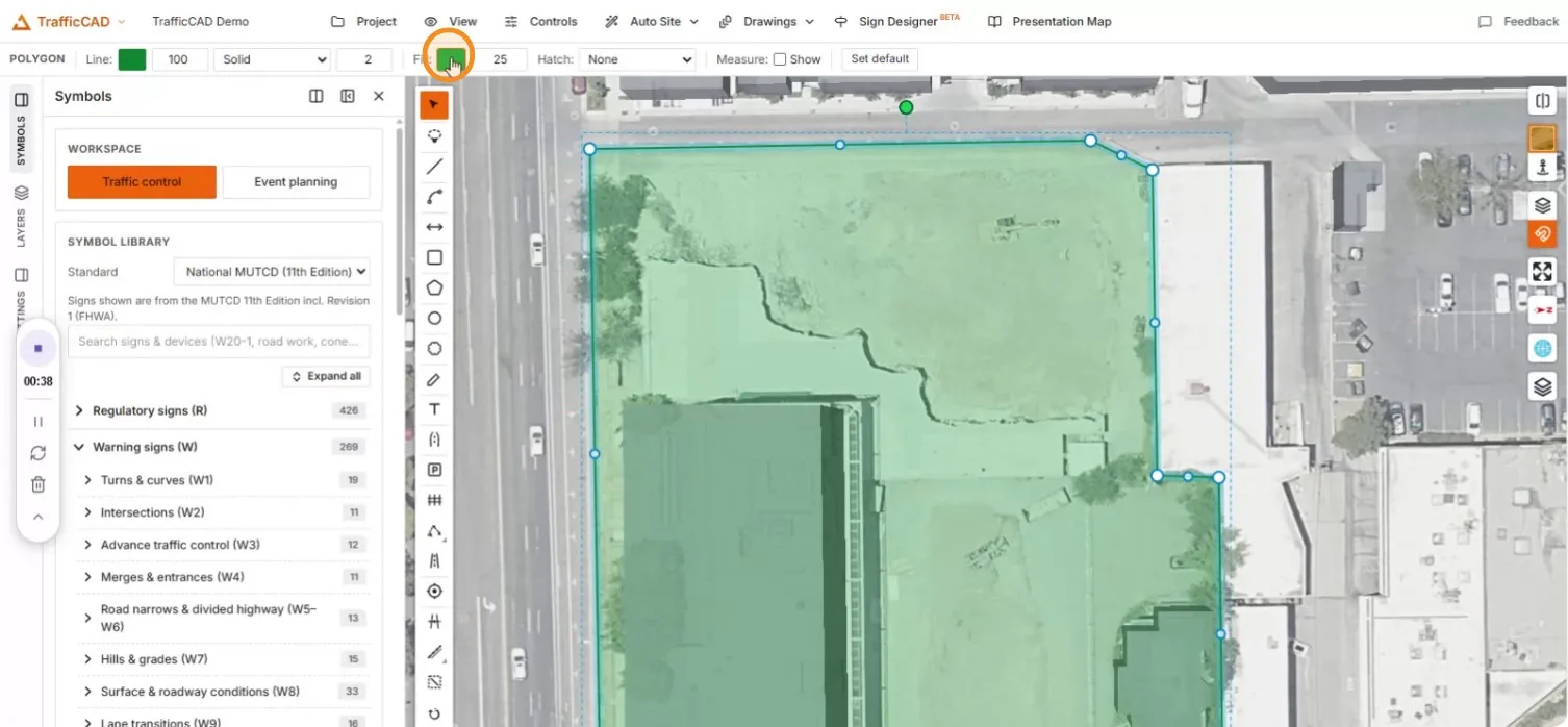 The completed boundary with a translucent green fill, fill swatch under the cursor